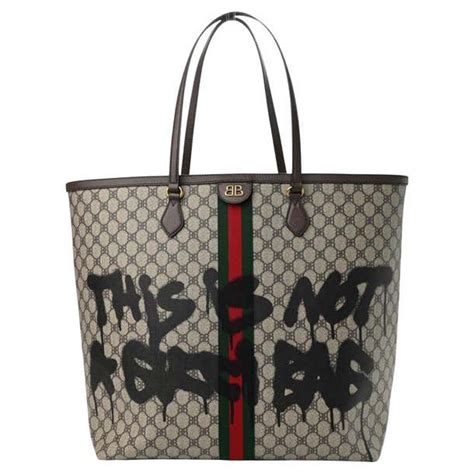 gucci bag graffiti|Gucci and Balenciaga collab bag.